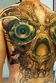 Modello unico del tatuaggio con teschio tirannico sulla schiena