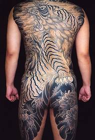 Чоловічі татуювання на тигровій квітці на спині