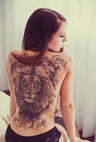 Beautiful girl with domineering lion tattoo