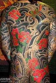 Uzorak tetovaže cvjetnog potočnog cvijeća s potpunim leđima