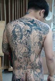 Мужчыны на поўнай спіне злыя татэмныя малюнкі татуіроўкі, як панк