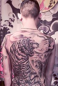 Tearing tiger totem tatoo