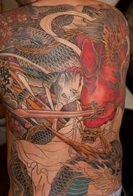 Klassike dominearjende full colour totem tattoo