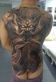 Dominasyon tatoo dragon nwa-gri
