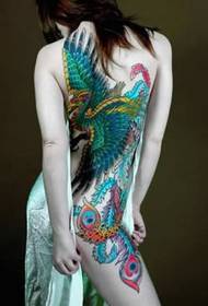 a gorgeous phoenix tattoo on the back of the model