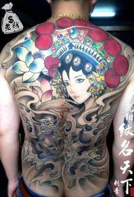 Man's back is full of beautiful flowers and tattoos