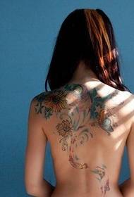 Дівчинка красива повна спина квіткові татуювання