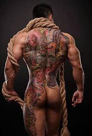Muskel mann helt tilbake totem tatovering tatovering sjarm ubegrenset