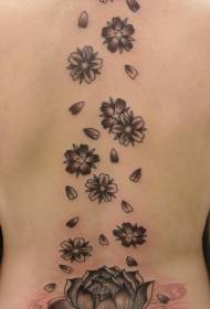 ブラックロータスと桜の背中のタトゥーパターン
