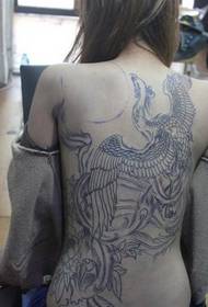 Female full-faced phoenix tattoo