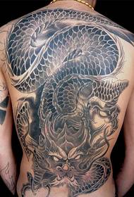 Ukubusa ngokupheleleyo i-tattoo yenamba emnyama