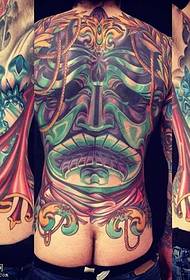Úplné zadní zelené masky tetování vzor