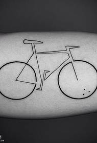 Tattooed bicycle on arm