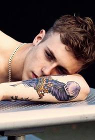 handsome arm good-looking feather crown tattoo