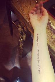 line English arm tattoo simple and generous