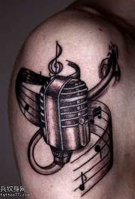 bracciu di moda di tatuaggi di microfonu di moda