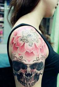 female arm beautiful lotus skull tattoo
