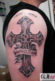 Crossman moet-hê kruis tatoeëring