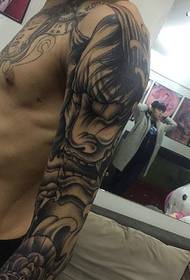 tsaj lub caj npab dub thiab dawb me me prajna tattoo