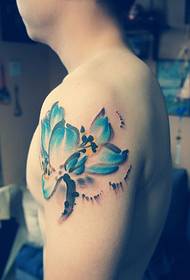 muste lotus lotus arm tatuointi