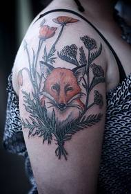 fox tattoo in the flower on the female arm
