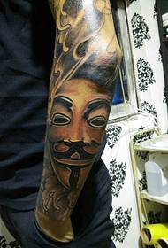 Tatouage totem bras mal Portrait