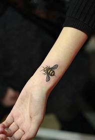 girl arm bee tattoo picture