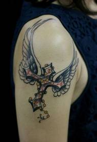 lány kar kereszt szárnyak tetoválás minta