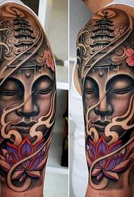 クールな仏頭の腕のタトゥー