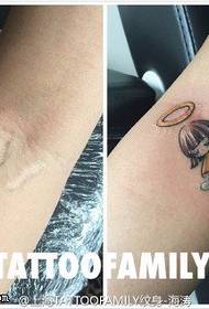 Concealer patrún tattoo cailín beag deas