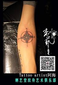 Personality compass arm tattoo