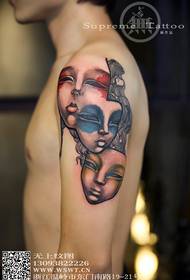 Tatuaggio maschera braccio personalità