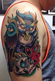Individual owl tattoo on the arm