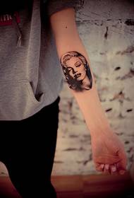 Sexy monroe head arm tattoo tattoo