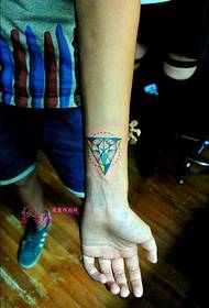 Concept creatieve geometrische figuur arm tattoo foto