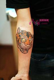 Cute tiger head arm tattoo picture