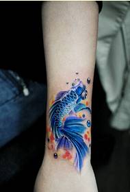 Stylish arm beautiful looking colorful goldfish tattoo pattern picture