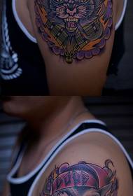 Little bad cat domineering arm tattoo picture
