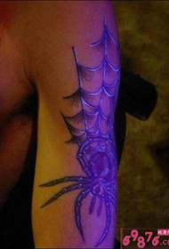 팔 창조적 인 거미 형광 문신 패턴 사진