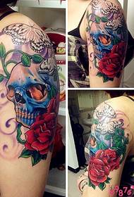 玫瑰與骷髏創意手臂紋身圖案圖片