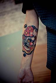 Креативен череп клоун мода ръка татуировка снимки