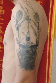 Questo tatuaggio del cranio è davvero un'immagine del modello del tatuaggio del braccio di forza