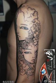 Красивый двухсторонний женский рисунок татуировки