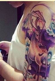 Fashionable female arm nice looking colorful starry antelope tattoo picture