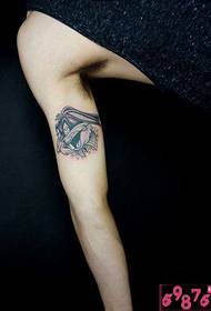 Rabbit starling head arm tattoo picture