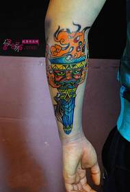 Creative retro totem torch arm tattoo picture