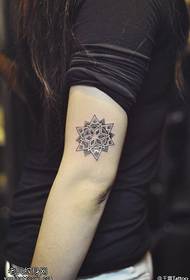Tricky snowflake tattoo tattoo