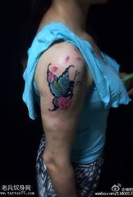 Modello tatuaggio braccio elfo farfalla colore