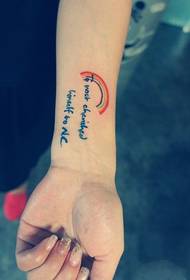 Fresh little rainbow English arm tattoo picture