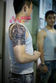 Boy mechanical arm tattoo picture